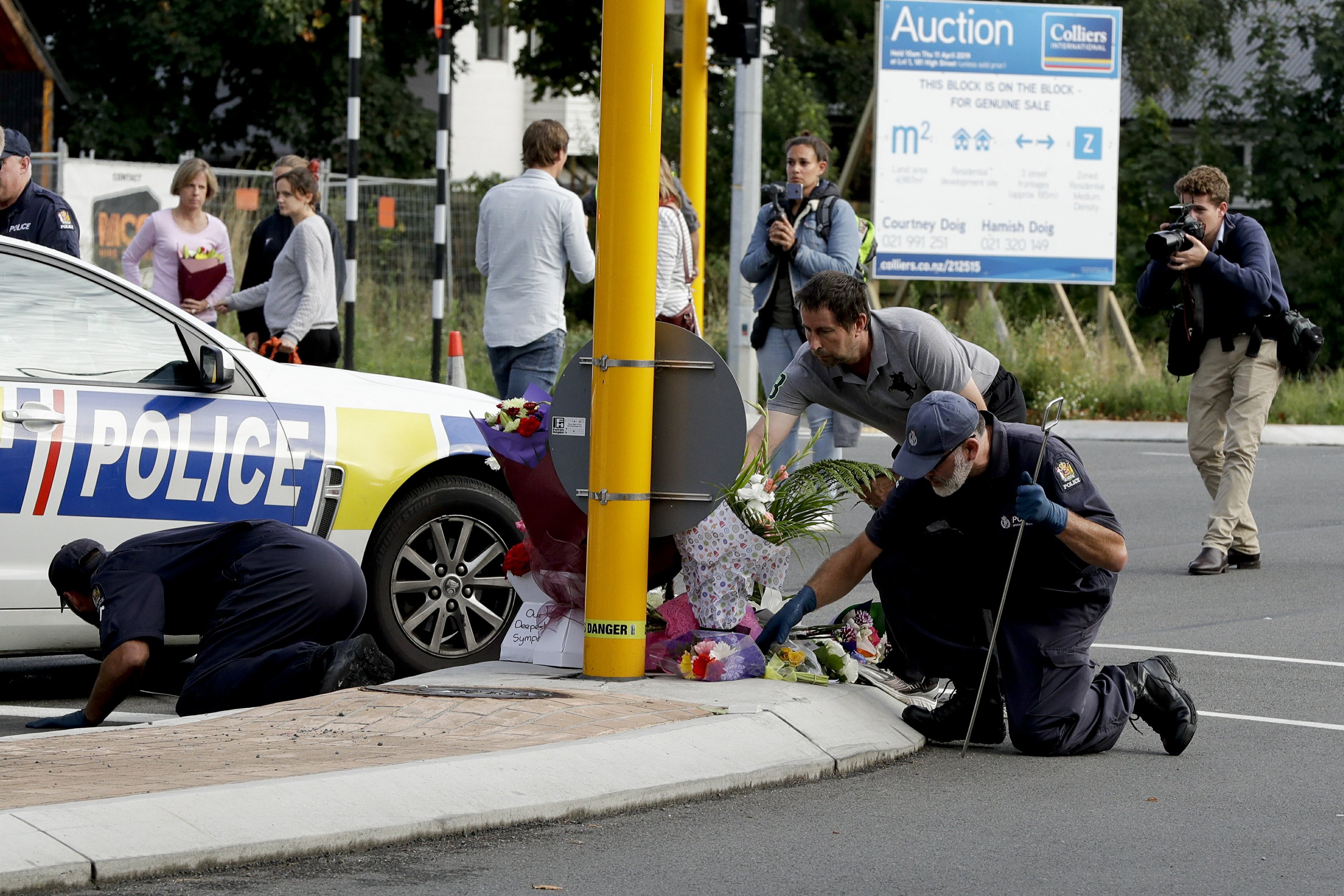 The Latest: New Zealand rugby match canceled for mourning