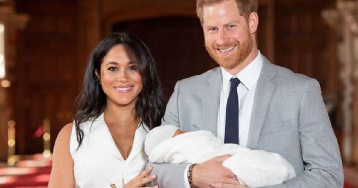 First pictures of Prince Harry and Meghan Markle with baby boy