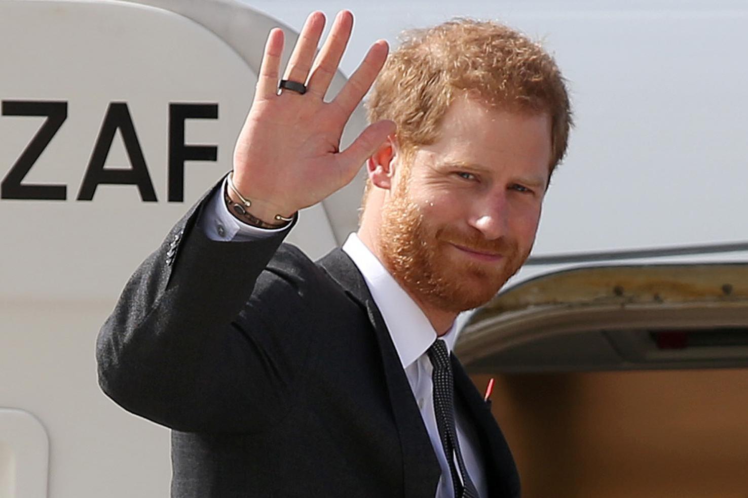 Prince Harry spotted flying commercial on the way home from Rome