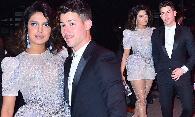 Priyanka Chopra commands attention in sequined silver minidress and sheer leggings as she joins a very dapper Nick Jonas at star-studded Met Gala after-party