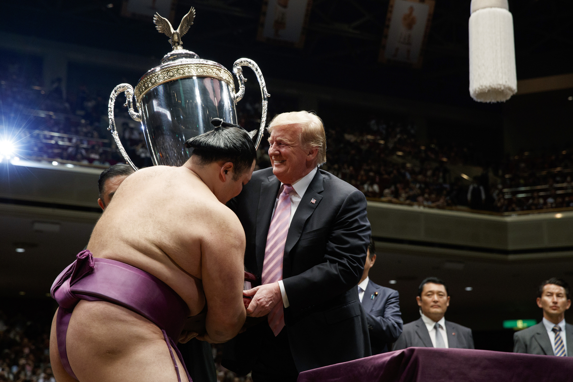 Trump awards trophy at marquee sumo event in Tokyo