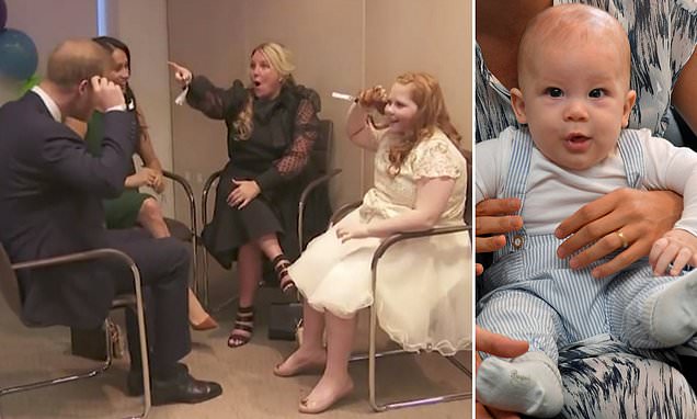 Adorable moment Prince Harry and red-head girl point at each other’s hair and say ‘snap’ – as Meghan Markle reveals young son Archie also sports ginger locks