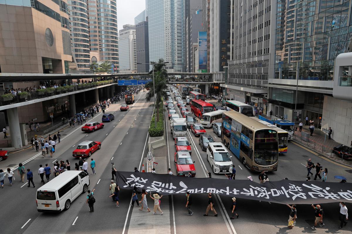 Hundreds take to Hong Kong streets ahead of new round of weekend protests