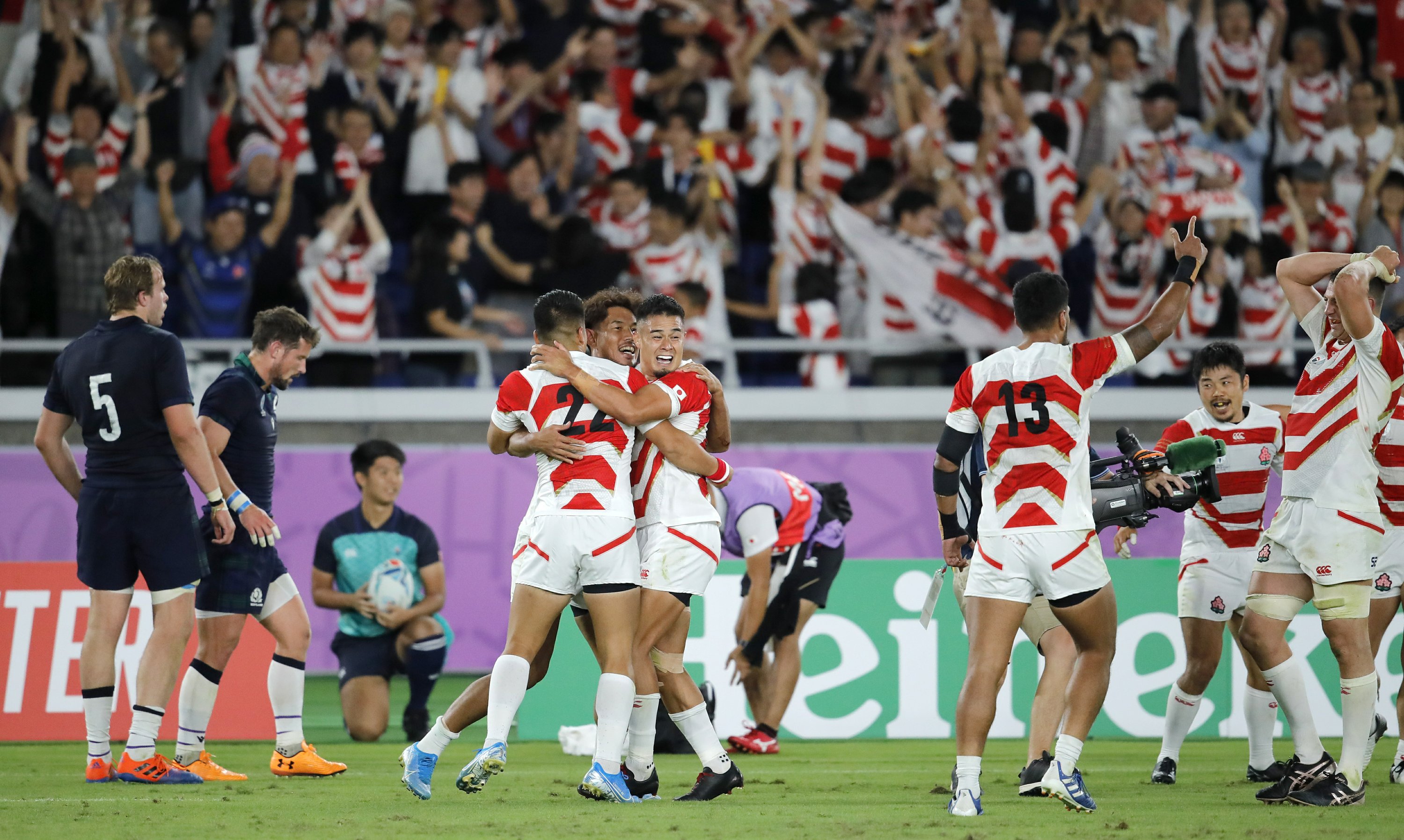 The Latest: Japan reaches first World Cup quarterfinal